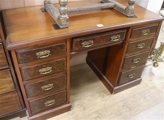 A Victorian walnut kneehole desk, W.122cm